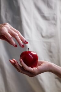 Apple being given by stranger